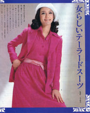Patricia wearing a fuscia buiness suit